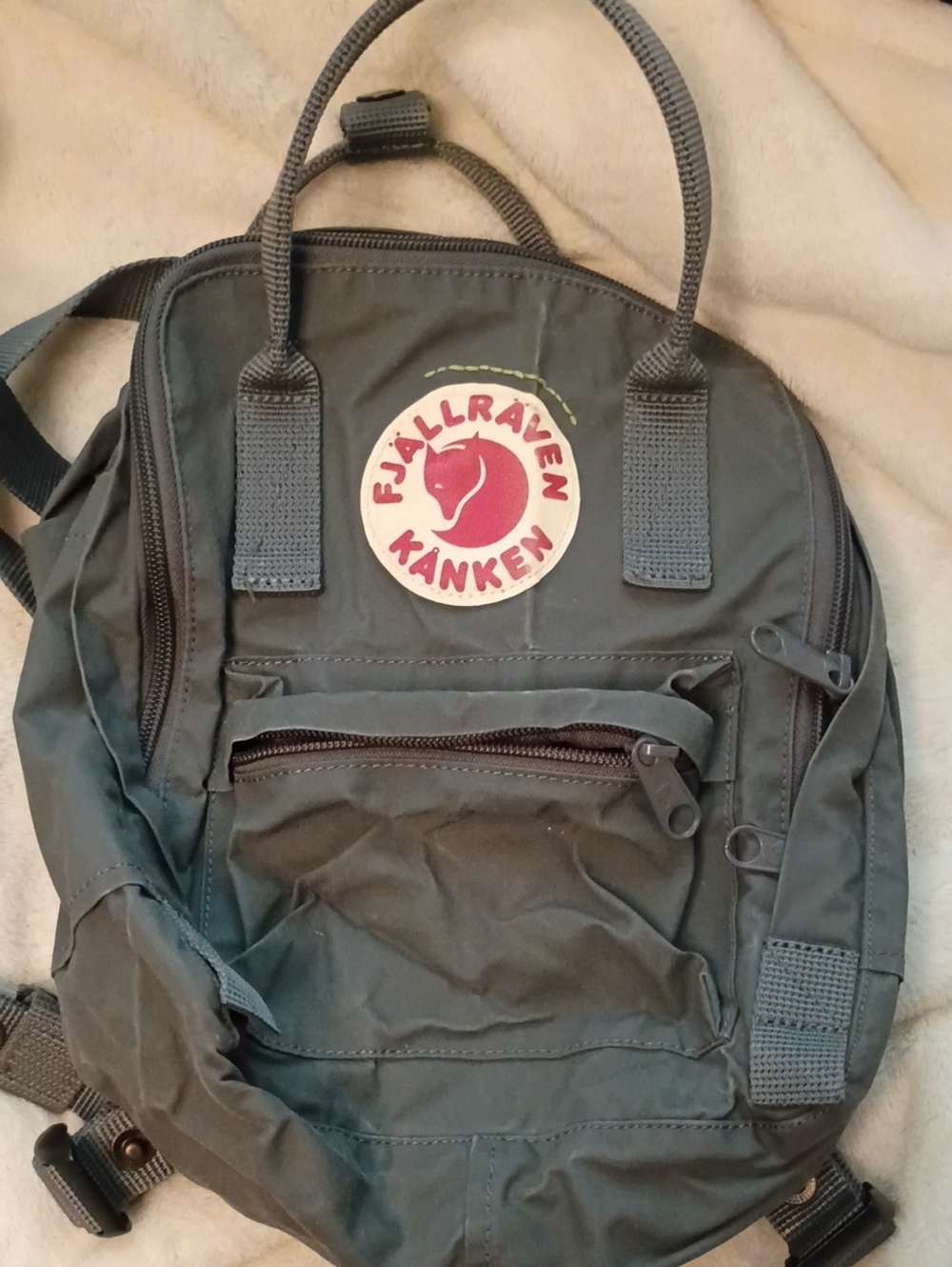 Fjallraven Kånken Mini Backpack in Dark Green with Red Logo
